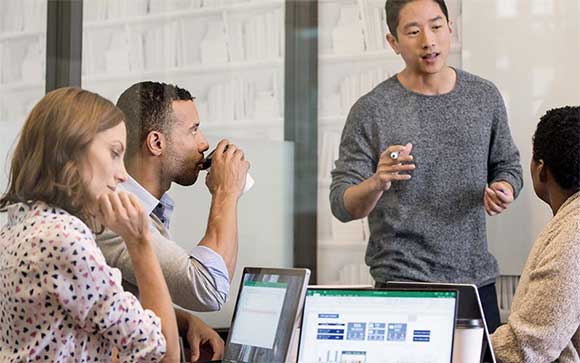 Group of professionals working in meeting